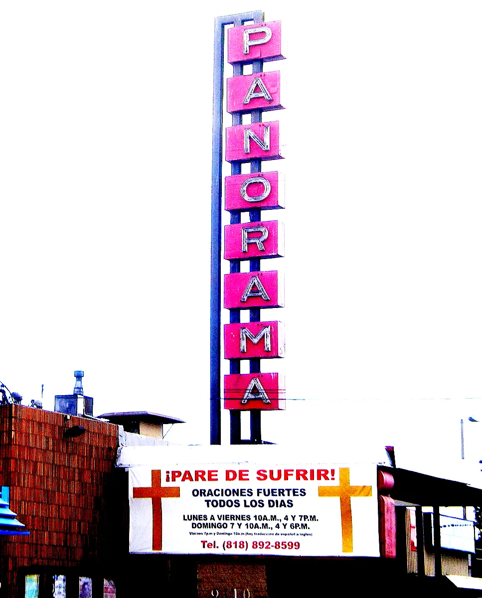 Tall vertical neon-style Panorama sign of the former Panorama Theater in Panorama City