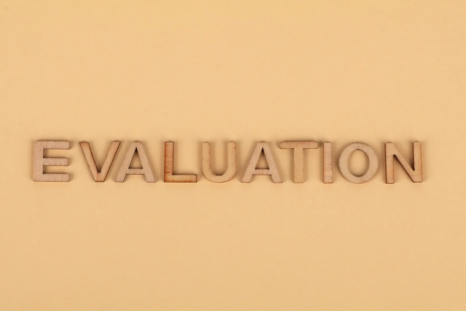 The word 'EVALUATION' in raised letters