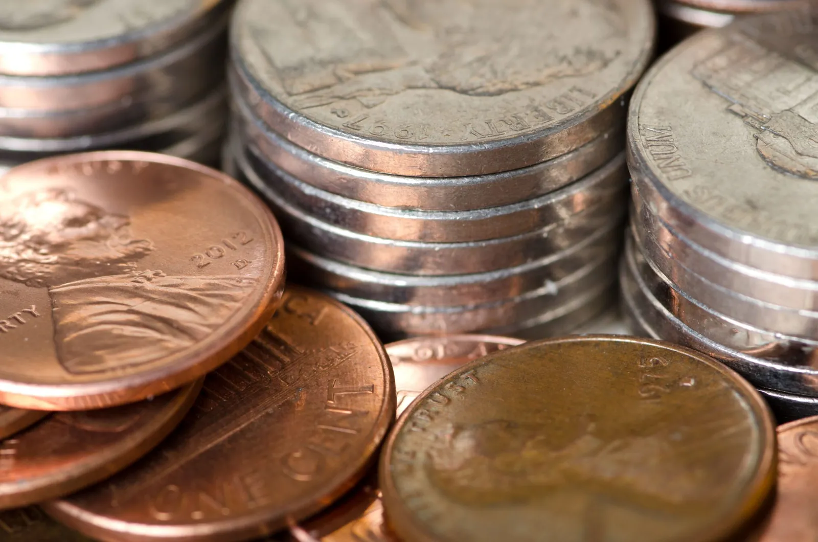 Close-up of stacked coins