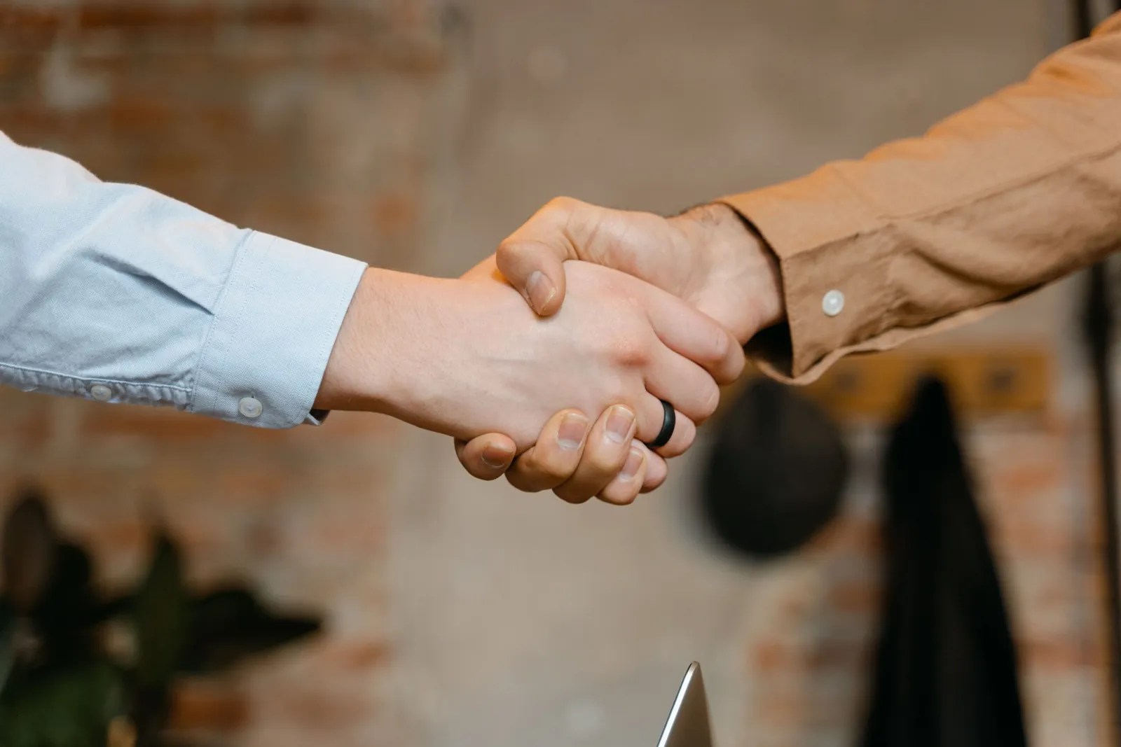 Close-up handshake between two professionals